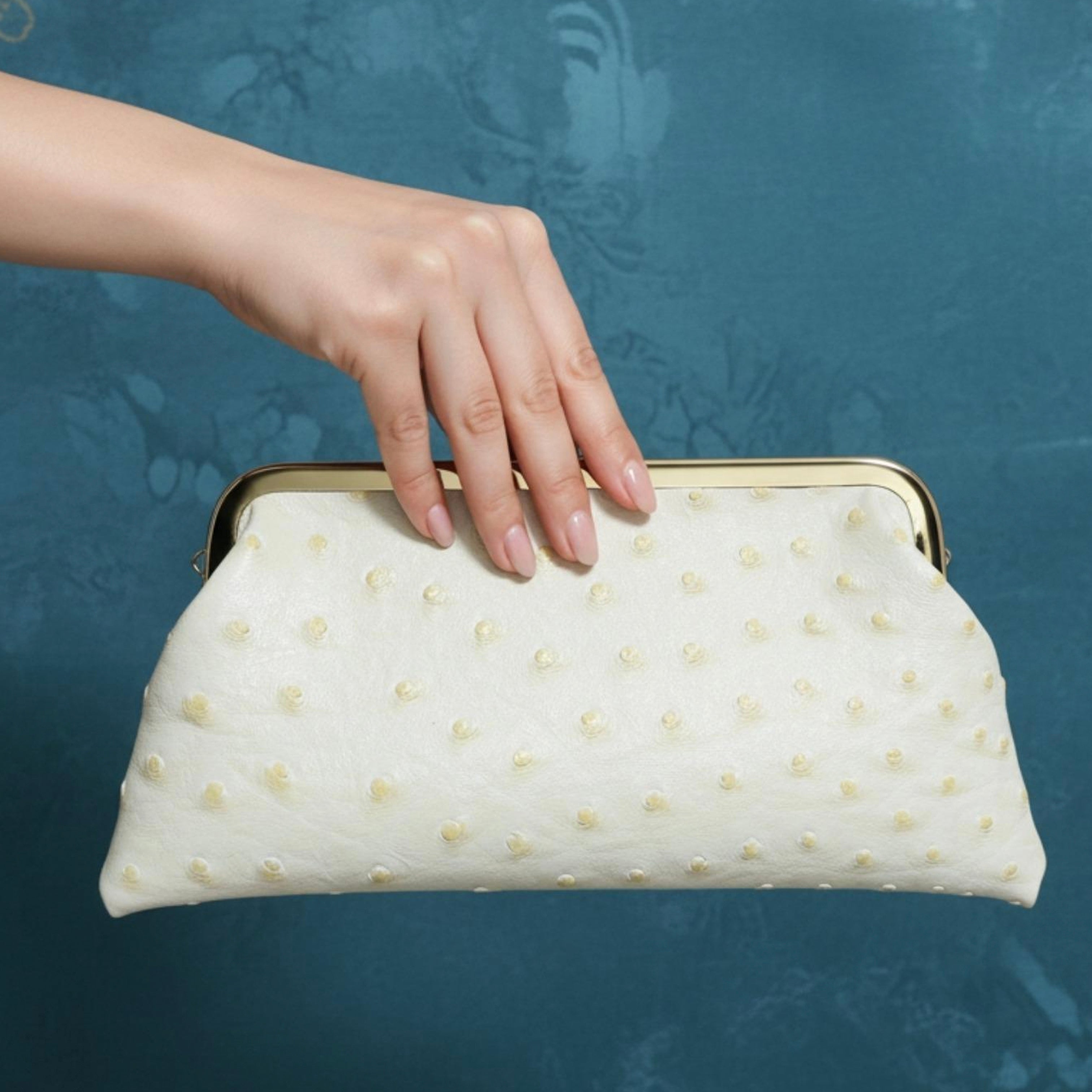 PU ostrich kiss lock purse clutch