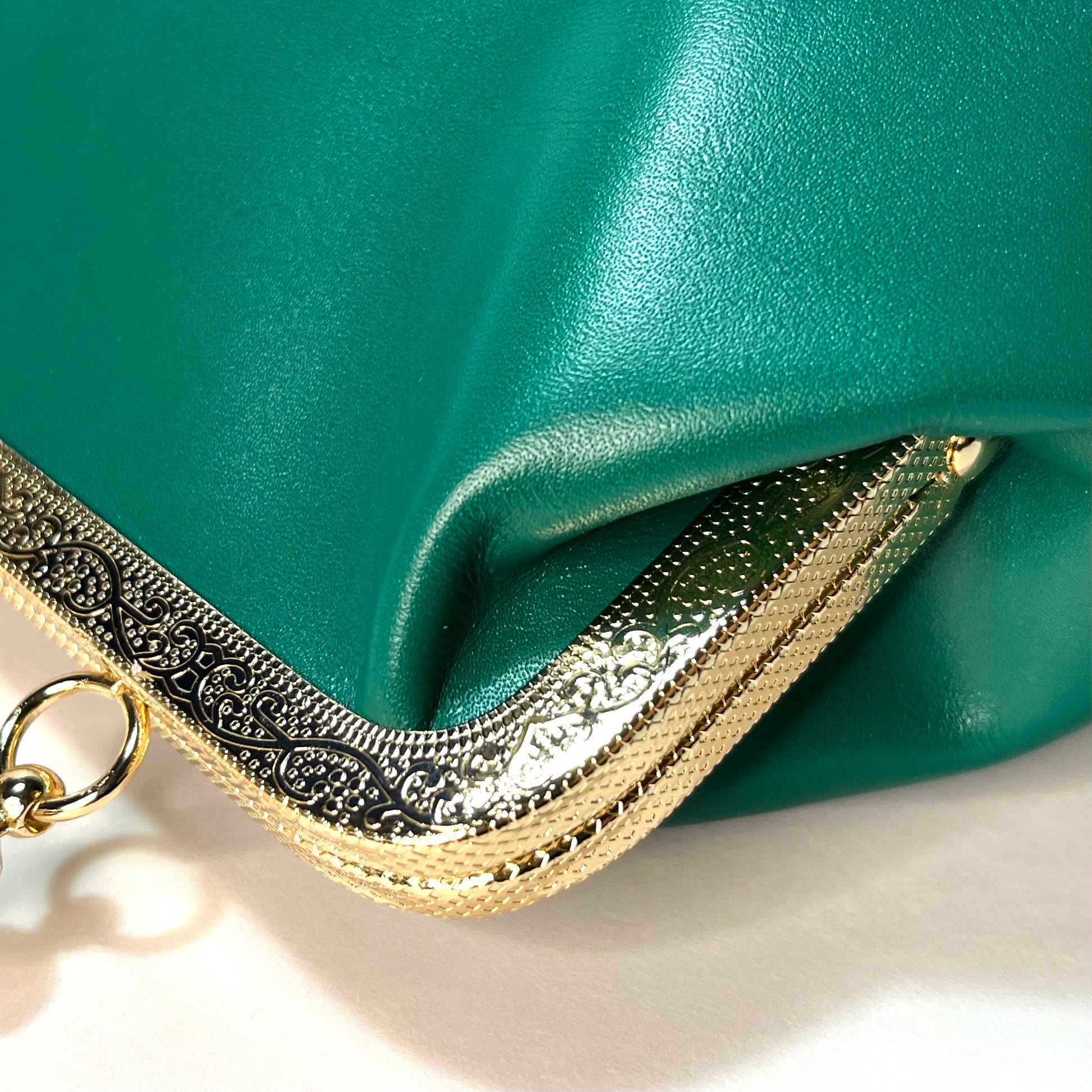 sheepskin dark green kiss lock small handbag