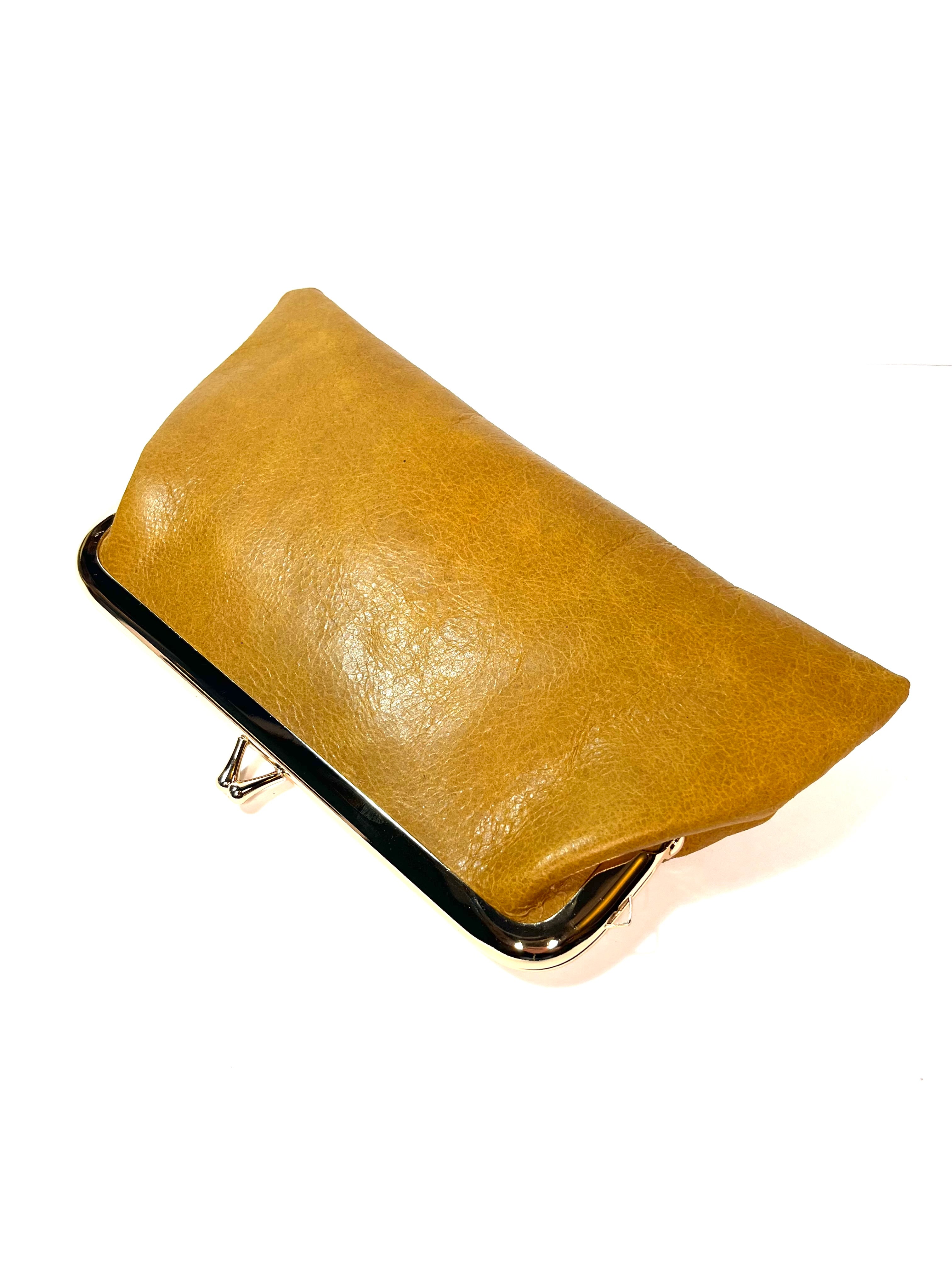 First leather cowhide  kiss lock purse clutch