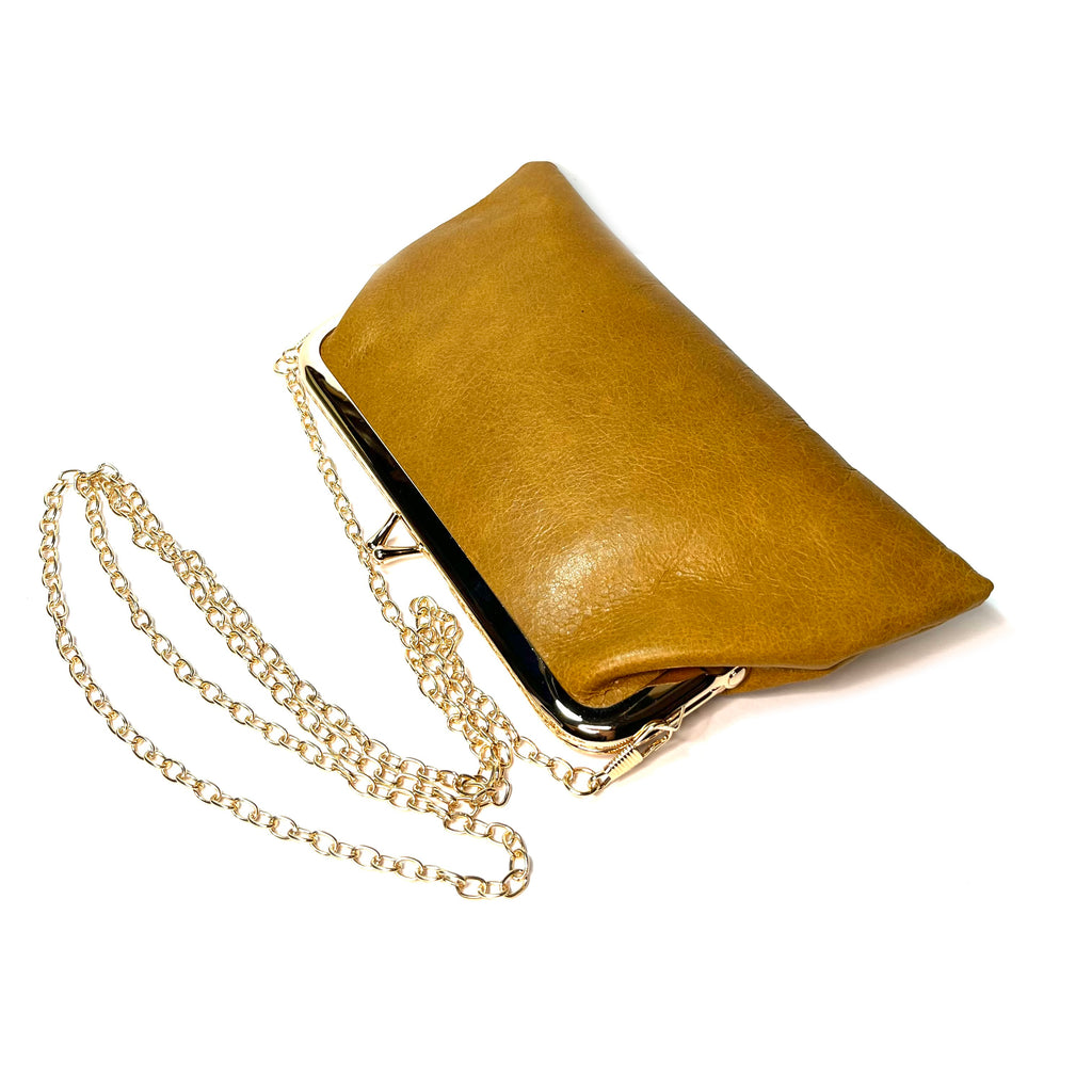 First leather cowhide  kiss lock purse clutch
